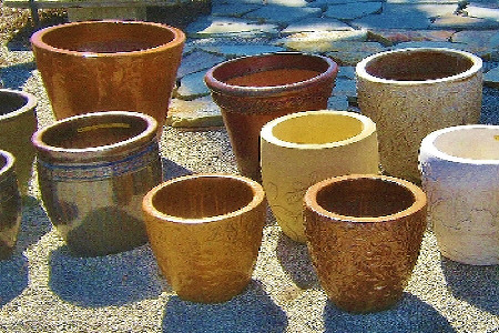 Collection of pottery in different sizes and colors