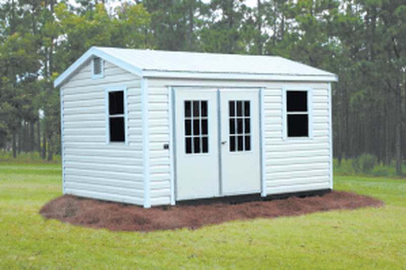 White shed with double doors